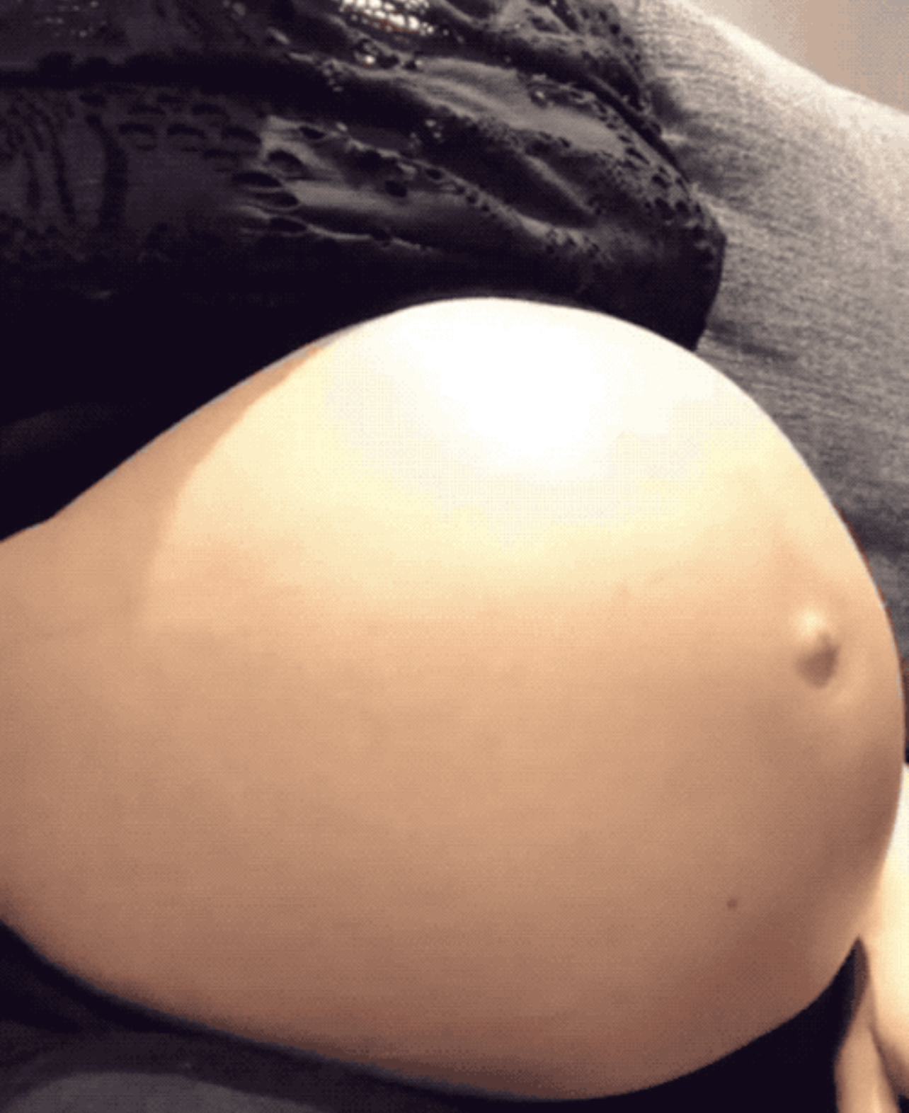 Pregnant black oiled belly pictures