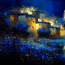 Glowing village under a starry night