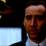Nicolas Cage as Stanley Ipkiss and The Mask
