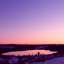 Sunset Over Puddle In A Feild