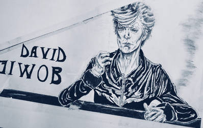 Bowie lighting a cig