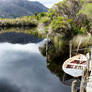 dinghy on Melaleuca Lagoon - SW Tasmania