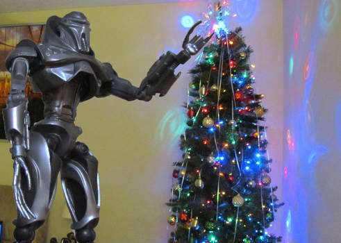 Cylon helps take down Christmas Decorations