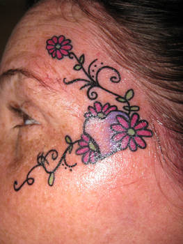 Face Tattoo-Flowers and Heart