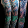 Haunted house sleeve tattoo by Jackie Rabbit