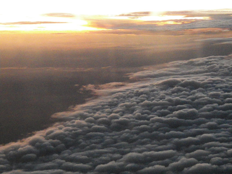 Sunrise above clouds