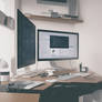 A desk with a laptop and a computer