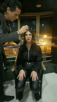 Arab woman hypnotized with a finger snap