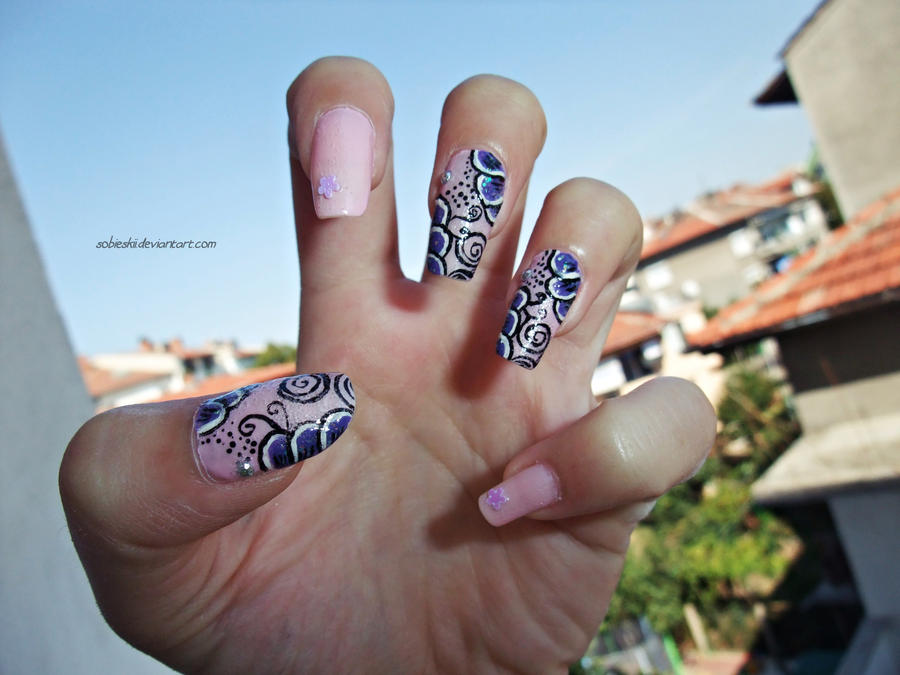 pink nails with purple flowers