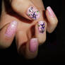 pink manicure with purple flowers