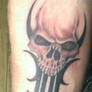 skull and tribal tattoo