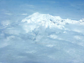 Mountain Breaking the Clouds