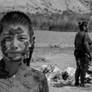 Kyrgyz Child on Coast Of Mud Lake