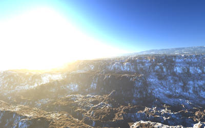 A canyon landscape with snow.