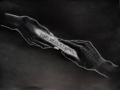 Drawing on black paper using white charcoal 