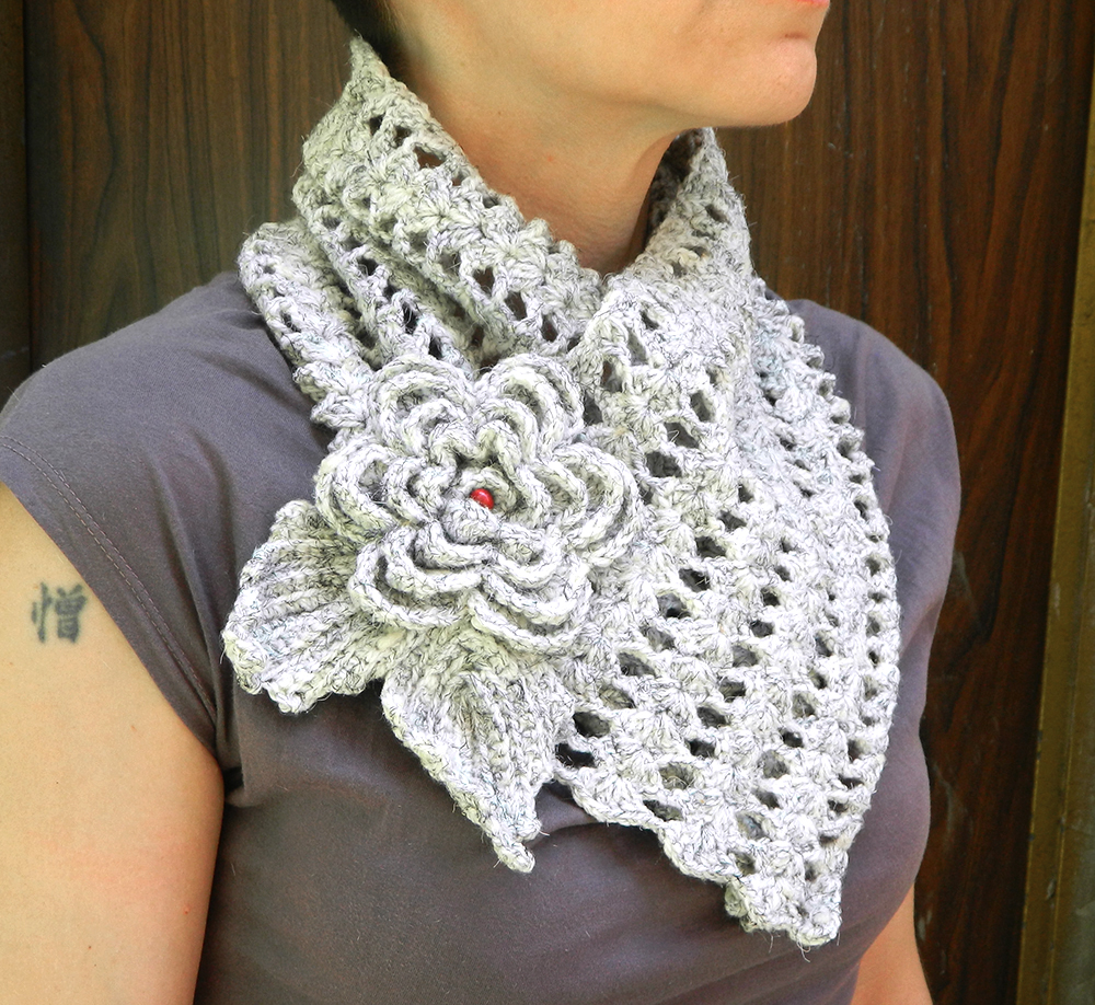 Fantasy lace crochet scarf with flower brooch