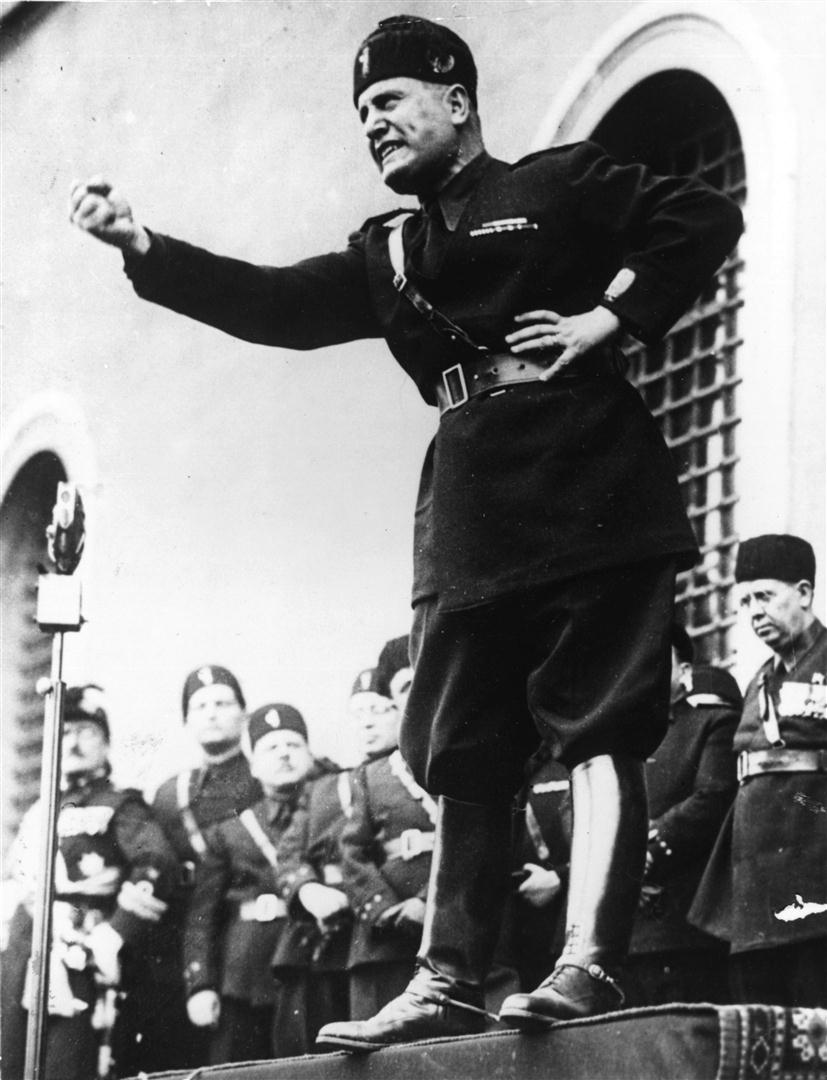 Mussolini shaking his fist