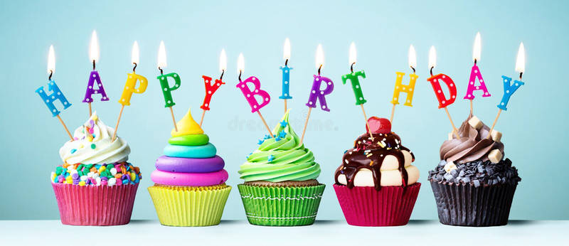 Colorful-happy-birthday-cupcakes-candles-spelling-