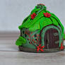 Tropical Fairy house with leaf roof and flowers