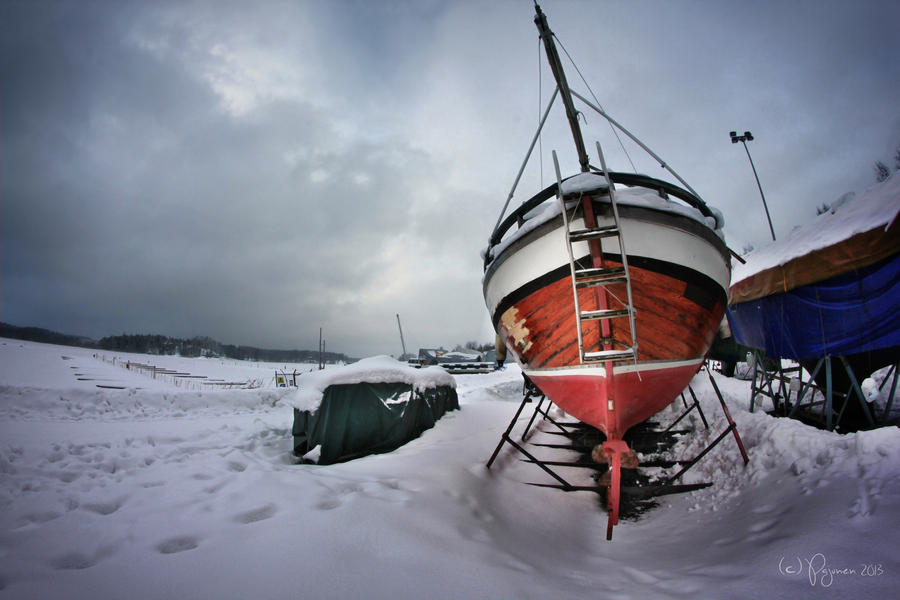 Old boat in winter