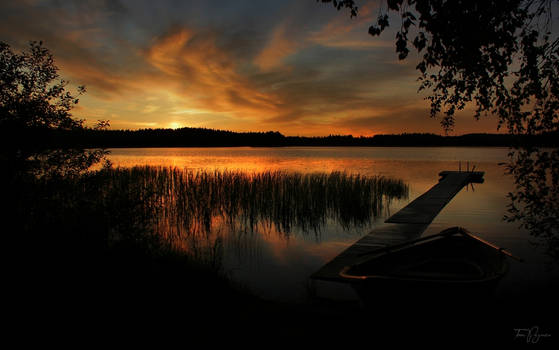 A rowboat by the lake