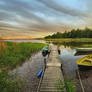 Rowboats by a Wooden Dock