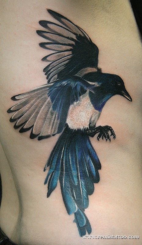 Flying magpie tattoo