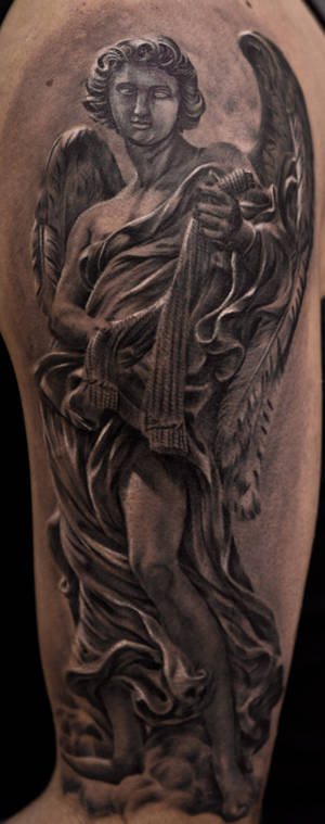 angel statue tattoo