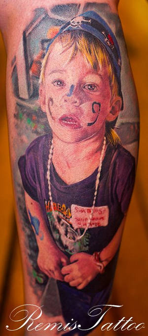 realistic portrait tattoo of kid