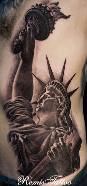 Black And Grey Tattoo Of Statue Of Liberty 