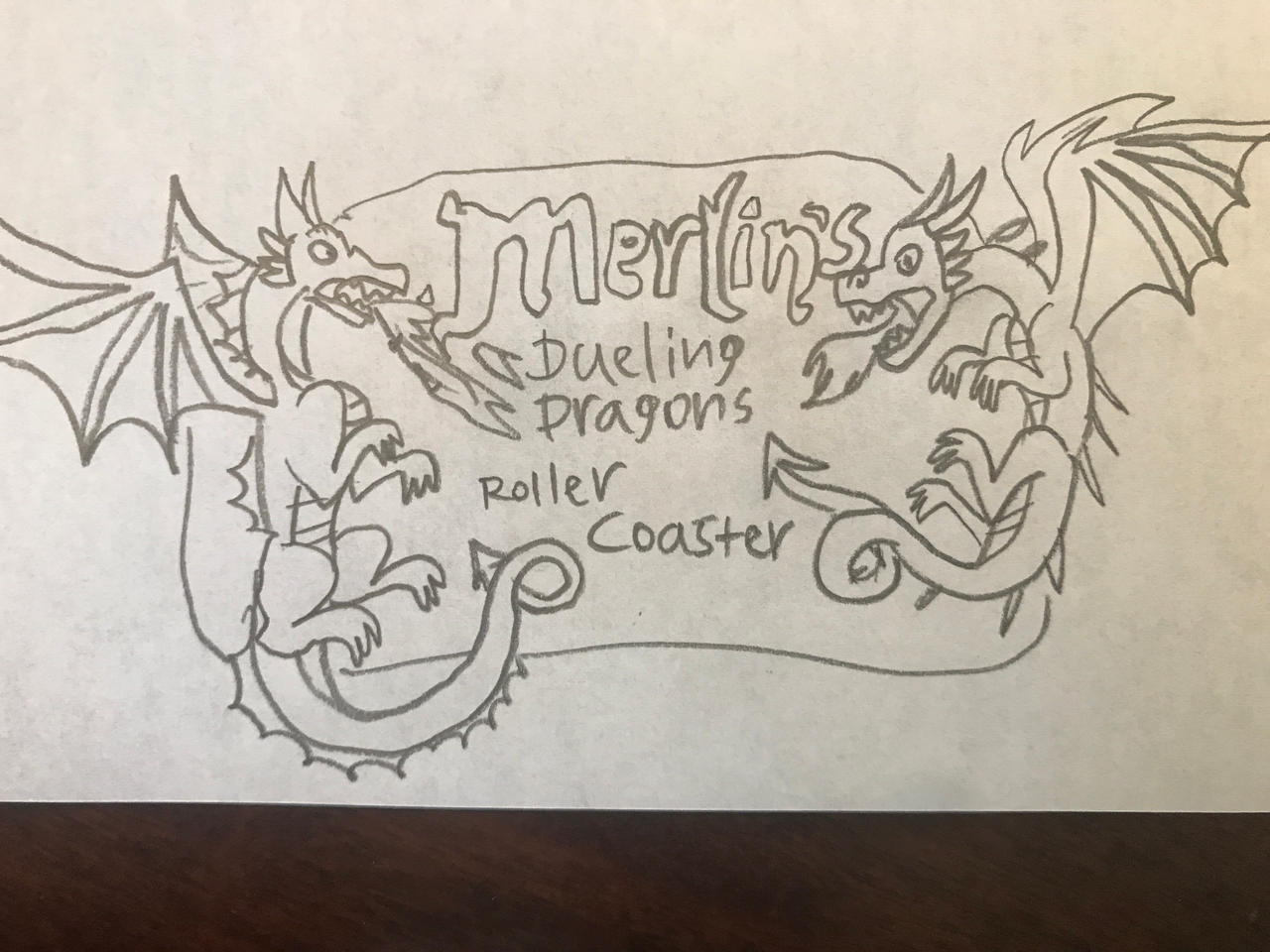 Merlin's Dueling Dragons roller coaster sign logo by ...