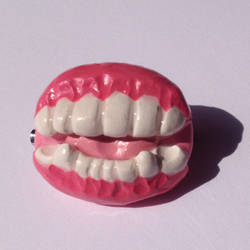 Mouth Brooch