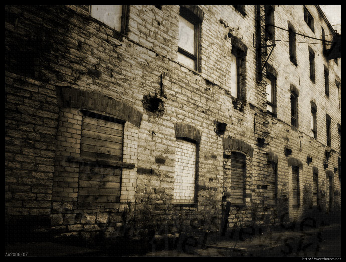 zona - wall of brick windows