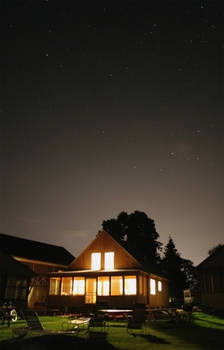 Bright Cottage under the Stars