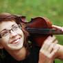 smiling girl and her violin