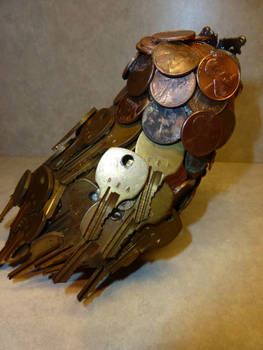 Owl made of keys and pennies (back view)