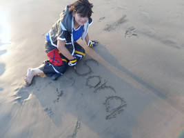 Sora playing in sand