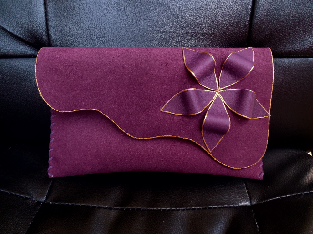 unique handmade leather clutch