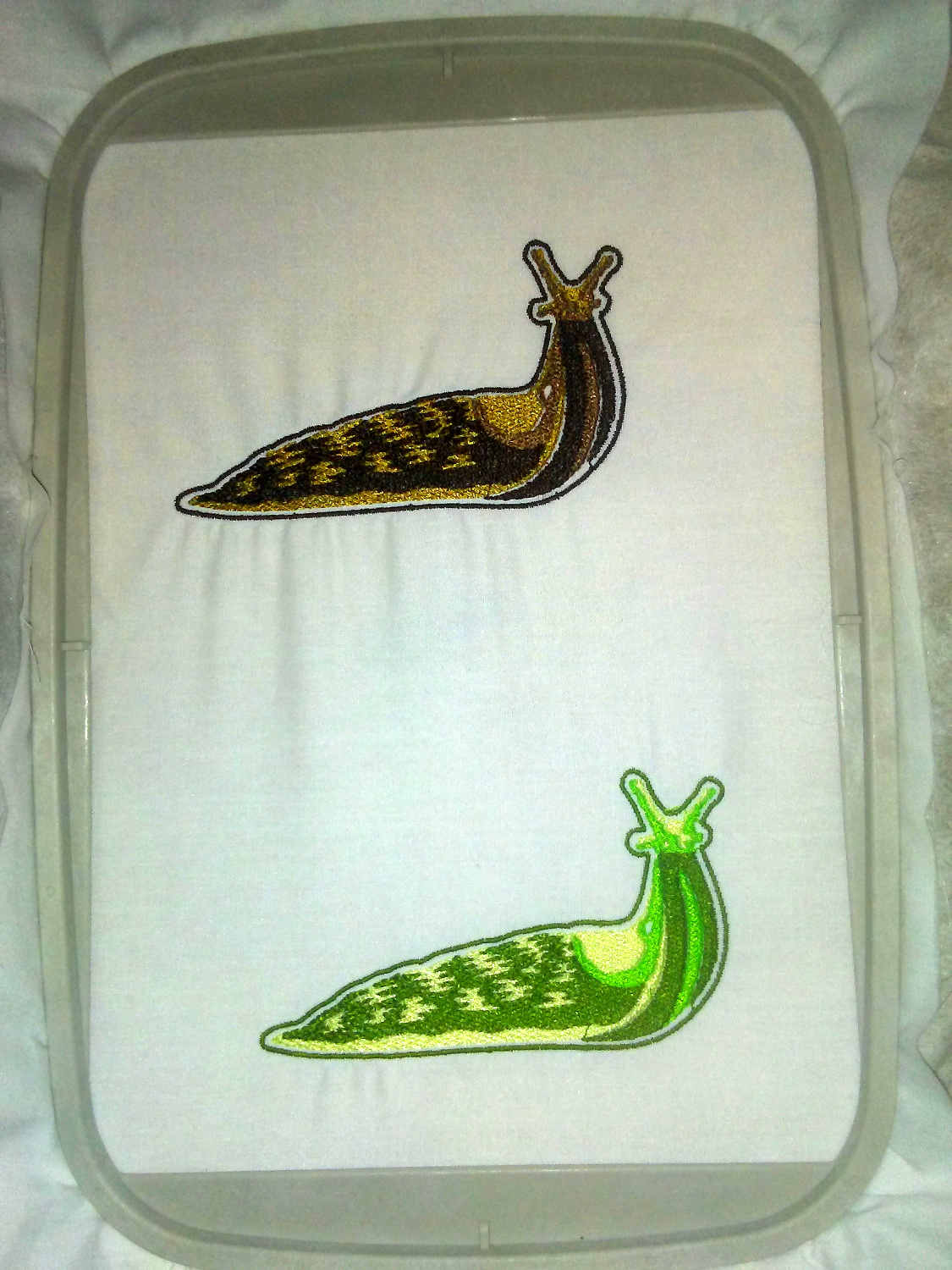 machine embroidered slug in two colors