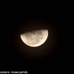 A [Half-Eaten] Moon At Chrismtas Eve