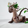 tree dragon with little friends