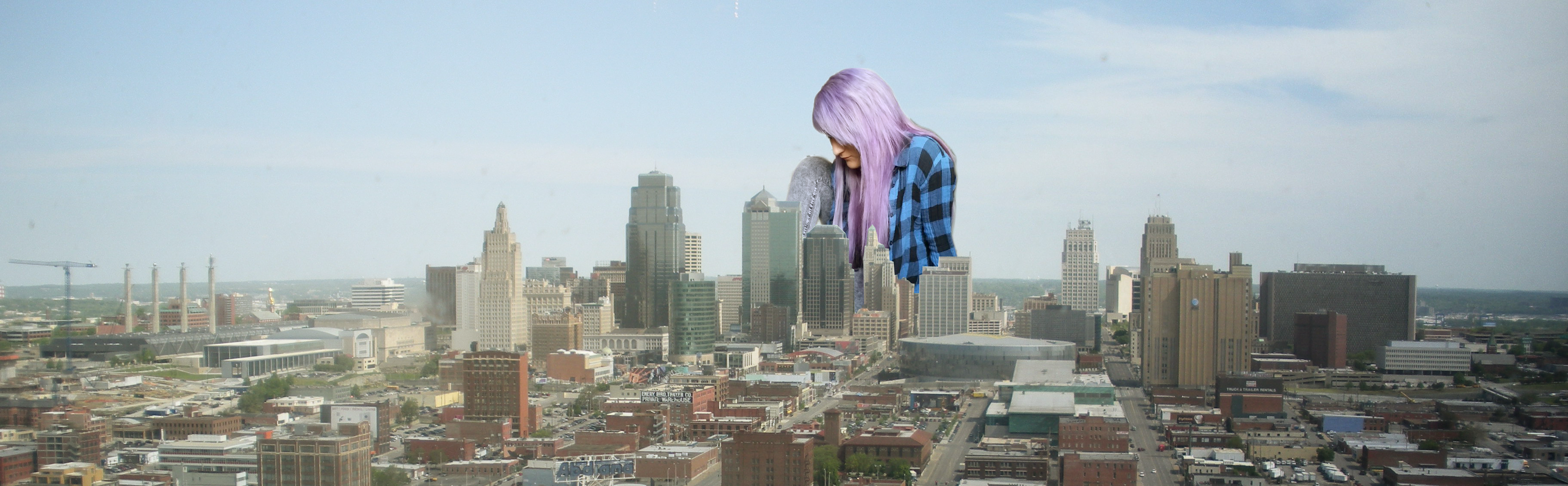 Giantess Kitty sits in her City