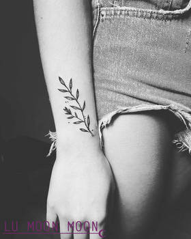 Small leafs tattoo