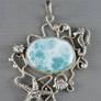 Silver pendant with a big larimar and seahorse