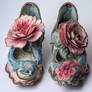 Now Two Pairs Of Shoes With A Pink And Blue Flower