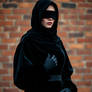 Lady With A Black Velvet Burqa Hood Over Her Head,