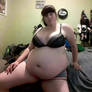 TayTay21 sitting on the bed being big and hot