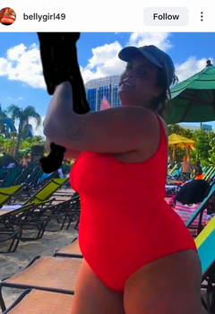 Well fed Katie Cummings in red one piece swimsuit
