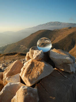 Glass sphere on summit