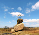 Piled stones + crystal ball